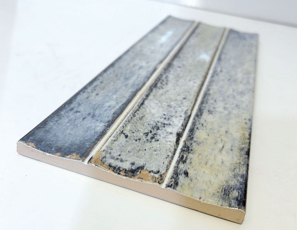 Delta Sky Glossy 5x13 ceramic wall tile, angled view of a single piece showing the glossy surface and edge