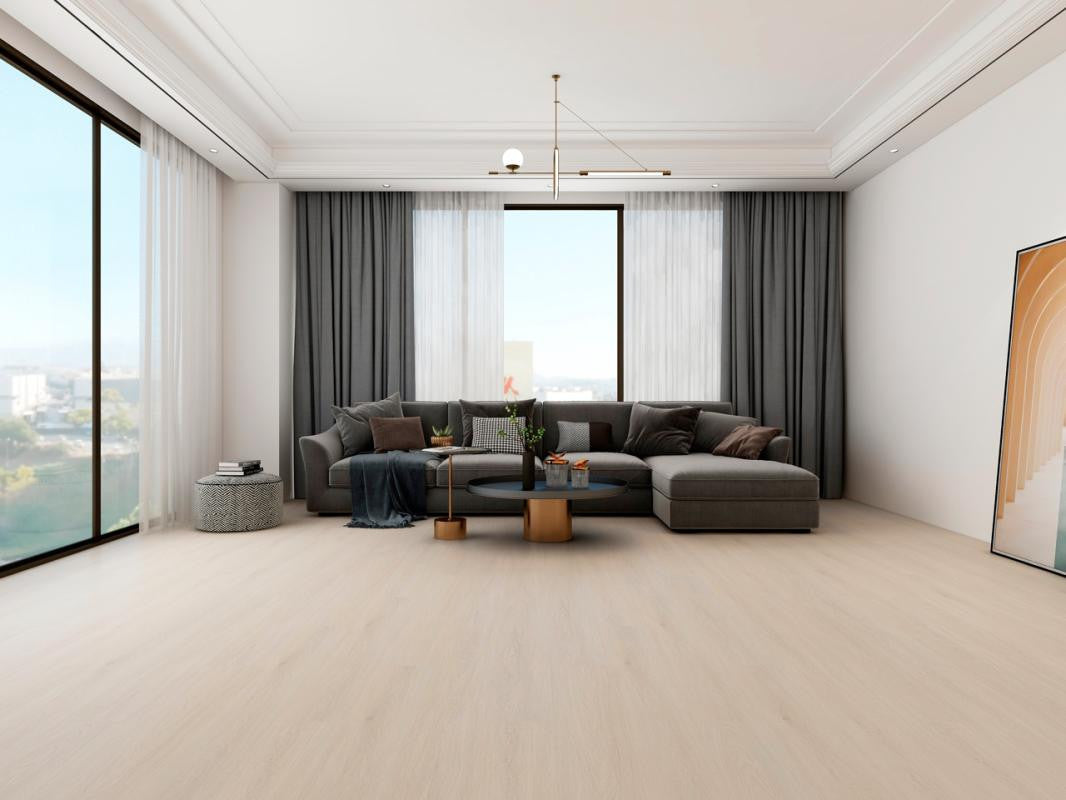 Bright modern living room with pale blonde wood-look plank flooring, gray sofa, and floor-to-ceiling windows