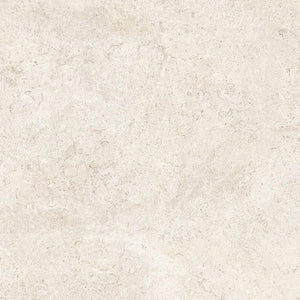 Baldosa de porcelana Coquina Blanco Roto 32x32 con aspecto de piedra shellstone