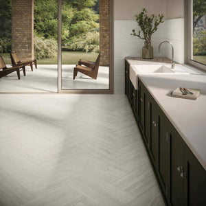 Baldosa de porcelana Aeterna Bianco de 12x24 con aspecto de mármol pulido