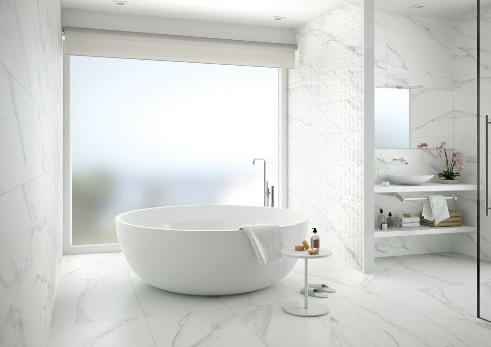 Modern bathroom with a freestanding bathtub and a white ceramic tile feature wall that looks like subway tiles.