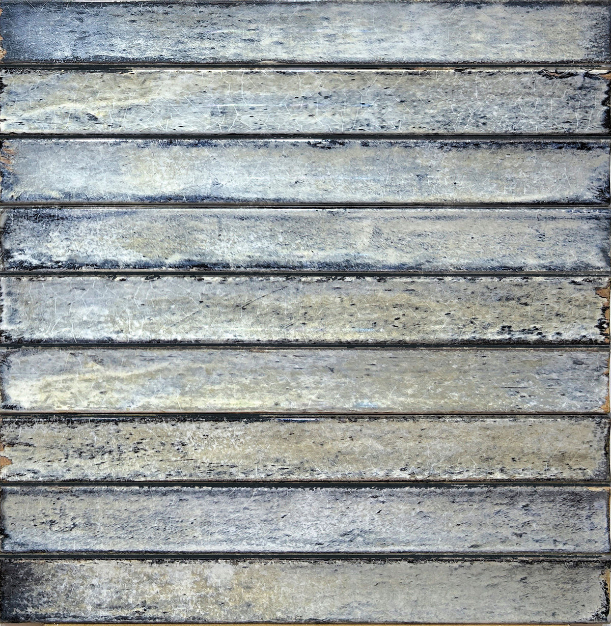 Delta Sky Glossy 5x13 ceramic wall tile shown in a multi-piece layout in blue-grey tones