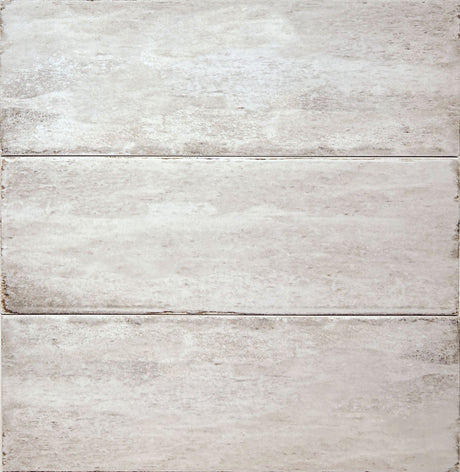Delta Beige Glossy 5x13 ceramic wall tile, close-up of three pieces showing the glossy beige glaze